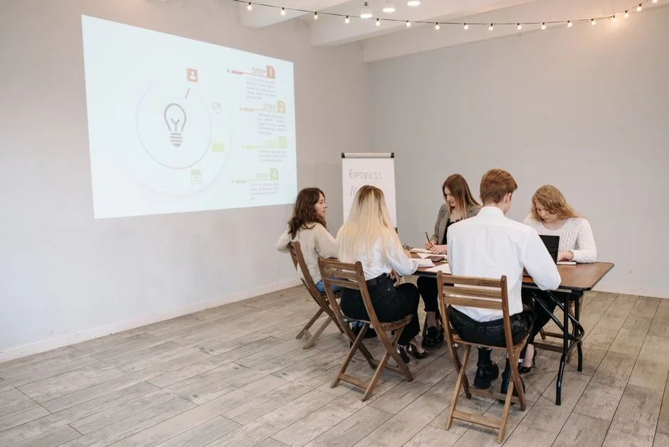 A contemporary workspace showcasing a laptop, tablet, and smartphones, ideal for tech and freelance use.